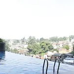 Minimalist And Spacious 1Br Apartment At Parahyangan Residence By Travelio