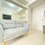 Minimalist And Spacious 1Br Apartment At Parahyangan Residence By Travelio